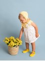 Knit yellow bonnet with bunnies framework