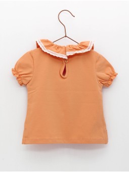 Camiseta cuello volante con estampado flores