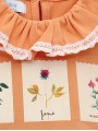Camiseta cuello volante con estampado flores