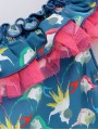 Bañador entero con escote asimétrico estampado loros y detalles en tul fluor